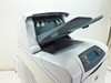 HP LaserJet 4200dtn Q2428A – top-front view with output tray open, control panel LCD and buttons visible