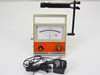 Beckman 72006 Expand-Mate portable pH meter front view with probe stand and external AC power adapter