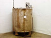 Stainless steel 350 gallon tank front-right view showing full tank body, steel pad feet, and top pump assembly