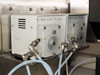 Symyx Technologies S14100 – close-up of two Monostat E-Series peristaltic pumps with tubing connections inside enclosure