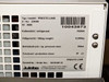 Symyx Technologies S14100 – lower cabinet doors open showing internal equipment bays