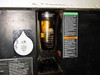 Sun Electric MRC 400 interior access panel showing desiccant filter/sight glass assembly and safety instruction placard