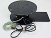 Harris/Farinon 1107 heated wafer chuck — top/rear view showing underside of 2.25-inch vacuum plate with mounting screw holes, brass side fitting, and pneumatic tubing loop