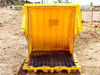 Eagle 1646RTC rotary top containment unit open — front-on interior view showing grated sump floor and yellow polyethylene shell