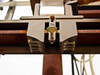 Adjustable clamp and guide rail assembly showing thumbscrew clamp block on horizontal support rod