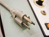 TEW TISF-452 standard 3-prong 110V power cord close-up showing oxidation on plug prongs