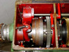 Bothner WB15 internal gear assembly close-up — red housing with large spur gear and adjustment linkage