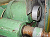 Bothner WB15 drive motor and belt pulley assembly — heavy green paint wear and surface rust on housing