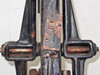 Lower column and base detail of F&B/CECO film splicer showing toggle switch, spring-loaded foot pads, and heavy cast iron base
