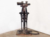F&B/CECO vintage 35mm film splicer full front view showing pedestal stand, spring-loaded arms, and foot pedal control cable