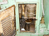 Barnes-Desenberg Model 5 interior access panel open showing internal drive mechanism with rust and wear on components