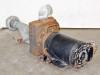 AMT 2822-95 pump and WEG motor assembly, right-side view showing discharge elbow, pump casing rust, and motor cooling fins
