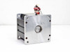 Emoteq QS05600-B02-H servo motor — rear face showing recessed bearing journal and mounting bolt holes on aluminum frame
