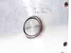 Close-up of rear bearing journal on Emoteq QS05600-B02-H motor showing light surface oxidation around the bearing race