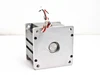 Emoteq QS05600 brushless servo motor rear face view showing circular shaft bore and corner mounting holes on aluminum frame