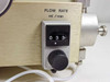 LDC ConstaMetric III G flow rate dial close-up showing mechanical odometer-style ml/min counter reading 0.33 and adjustment knob