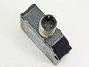 Banner QM42VP6LPQ photoelectric sensor — top view of 4-pin M12 male connector with gold contacts