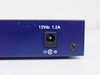 Netgear FS108 rear panel close-up showing 12Vdc 1.2A power input barrel jack