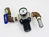 SMC AR40-N04G-Z pneumatic pressure regulator assembled with Nibco brass ball valve and quick-connect fitting — full front view
