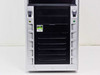 AMD Sempron 2600+ desktop tower – front panel close-up showing AMD Sempron sticker and front bezel with drive bay doors