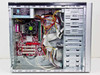 AMD Sempron 2600+ MSI K8MM desktop tower – interior view showing MSI red motherboard, AMD CPU with heatsink fan, power supply, drive bays, and cable routing