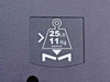 Close-up of maximum load capacity label on Dell 7W762 — 25 lb / 11 kg MAX