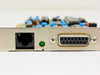 Networth EtherNext PCB 1012-1 bracket close-up showing RJ-45 UTP port, green LED indicator, and DB-15 AUI connector with light dust on bracket