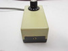 Bausch & Lomb intensity controller — end view showing rotary dial and power output jack on gray bottom panel