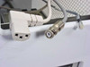 Cables exiting the system including IEC power connector, BNC connector, and RJ-style connector