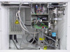 Interior of Pfeiffer Balzers TPH 050 system showing turbo pump, wiring, power supply, and Televac gauge