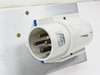 Legrand P17 58265 industrial plug closeup mounted on panel, showing four-pin 3P+E configuration with brass contact pins visible