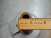 Close-up measurement of small 1-inch nozzle opening with ruler showing approximately 1-inch inner diameter