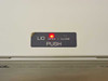 Tomy MX-160 centrifuge lid open/close push button panel with illuminated red indicator light