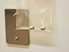 Tomy MRX-151 accessories — spare fuses in sealed bag attached to rear panel bracket