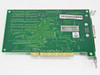 STB Systems 1X0-0272-007 PCI video card rear/solder-side view showing PCB traces, compliance sticker, and PCI gold-finger edge connector