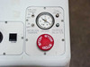 Villa Precision GS-210 operator panel detail showing Air/Vacuum Enable switch, vacuum gauge, Interlock Override toggle, Low Vacuum indicator, and red STOP emergency button