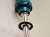 MTS Temposonics LT107501000 rod-to-housing junction showing mounting flange and seal/gasket