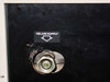 Varian 323-0012 helium supply port close-up — brass oval quick-connect fitting with Helium Supply label on front panel