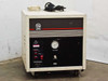 Varian 323-0012 Cryocompressor 2.1 — front panel view showing supply pressure gauge, status indicators, and Varian logo on wheeled cabinet