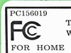 Actiontec PC156019 FCC ID label close-up showing FCC registration mark and for home or office designation