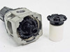 SMC AW30-03 further disassembled – body showing internal centrifugal baffle and turbine; filter element shown separately alongside