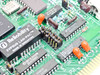 Tiara Lancard/E-PC 16 — close-up of Reliability 2VP5U9 LAN-PAC module marked 'Made in Singapore' and surrounding ICs including SN74LS688N