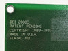 DEI 2000C PCB silkscreen closeup showing model number, Patent Pending, Copyright 1989-1991, Made in USA markings