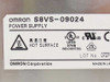 Omron S8VS-09024 power supply – close-up of product label showing model number, UL listing, HOT SURFACE warning, and Made in Japan
