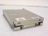 Compaq 141350-001 TEAC FD-235HF 3.5-inch internal floppy drive – angled front/top view showing metal housing and label