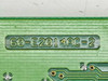 Close-up of Winbond 60-E2014AC-2 part number molded into PCB edge — reads 60-E2014AC-2