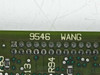 Wang 9546 PCB silkscreen closeup showing '9546 WANG' printed on board with solder joints and surface-mount components