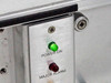 Close-up of D-9130 front panel indicators showing Power On green LED and Major Alarm LED
