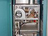 Plasma-Therm HFS 3000D RF Generator – interior upper compartment with blower fan, helical coil, and Jennings variable vacuum capacitor visible