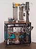 Rear/side view of full system on rolling cart — bell jar from rear showing ion source, vacuum plumbing, diffusion pump, and hoses beneath